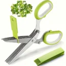 Five-layer stainless steel kitchen scissors cutting fresh green scallions on a wooden chopping board.