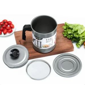1.4L stainless steel oil strainer pot and grease container with fine mesh filter on a kitchen counter.