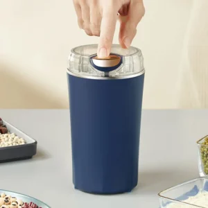 Donirt small electric grinding machine with stainless steel housing for coffee beans and nuts.