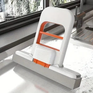 Mini handheld self-squeezing sponge mop for cleaning tabletops, bathrooms, and kitchens.
