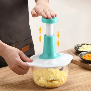 Manual vegetable cutter with press type design for home kitchens