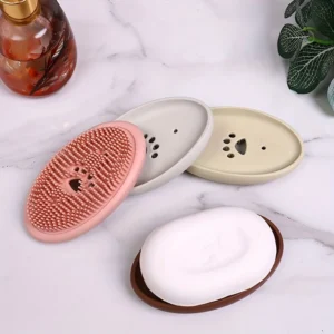 Creative drain soap tray with integrated cleaning brush and self-draining rack for bathroom use.