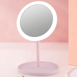Dimmable LED cosmetic mirror with rotating stand and USB charging port for makeup application.