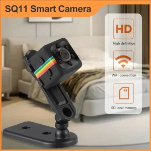 Small black mini camera HD lens hidden discreetly between books on an office shelf for security.