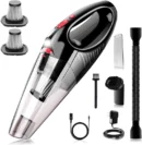 Matte charcoal gray 4-in-1 wireless handheld car vacuum cleaner cleaning dust between vehicle leather seats.