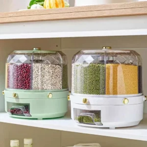 Clear 360-degree rotating grain dispenser filled with colorful rice, beans, and corn grains on a clean kitchen countertop.