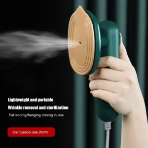 Elegant mint green mini iron streaming steam smoothly onto a wrinkled linen shirt on a compact travel ironing pad.