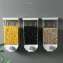 leek transparent wall-mounted grain storage box filled with colorful lentils, rice, and oats on a modern white kitchen wall.